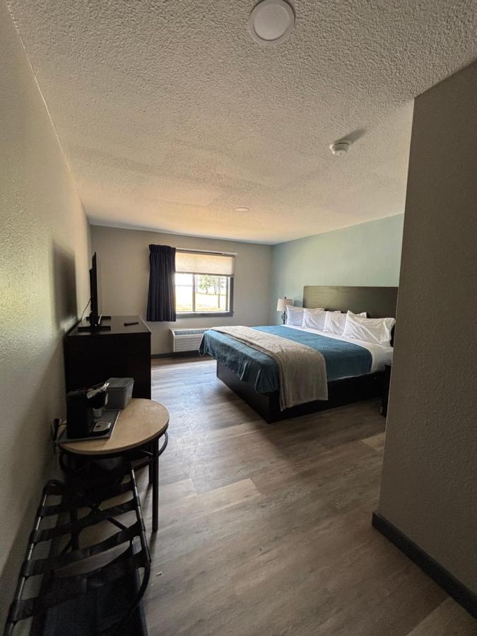 King room with lake view window and coffee maker